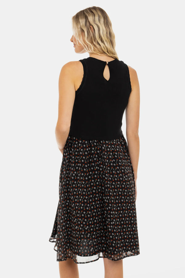 Rochie elegantă cu top negru din bumbac ripsat și fustă vaporoasă cu imprimeu floral