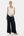 Pantaloni din satin cu pliuri pentru gravide – bleumarin