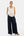 Pantaloni din satin cu pliuri pentru gravide – bleumarin