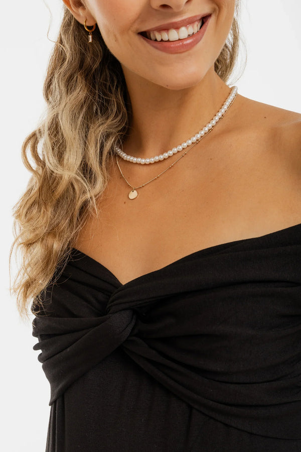 Bluză elegantă pentru gravide cu nod decorativ – neagră